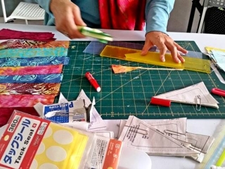 Using cutting board and rotary cutter Using cutting board and rotary cutter